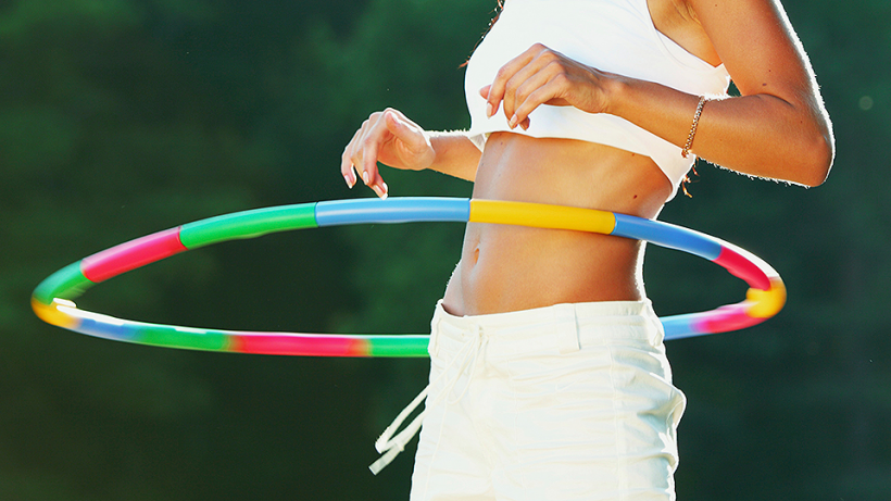 A Chicago woman attempts to break the Hula Hoop record.