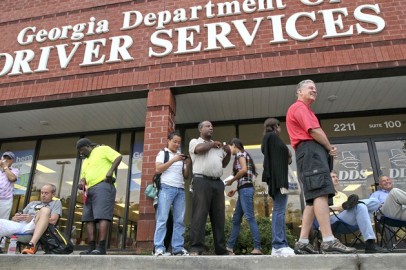 U.S. citizens are waiting on line outside the Georgia Department of Driver Services