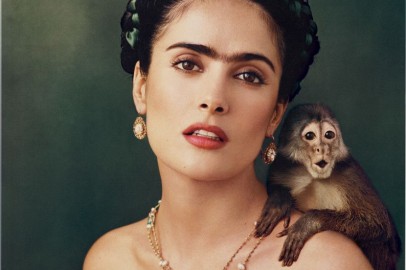 Salma Hayek alongside with the monkey who attacked her years ago.