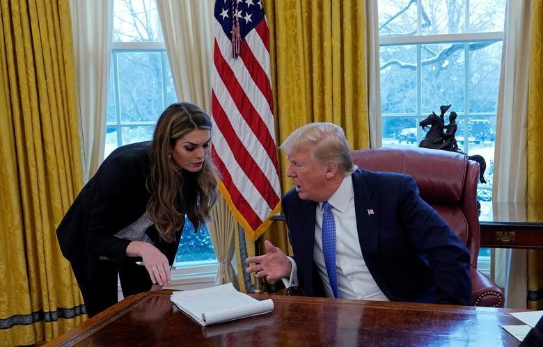 Hope Hicks speaking with President Donald Trump