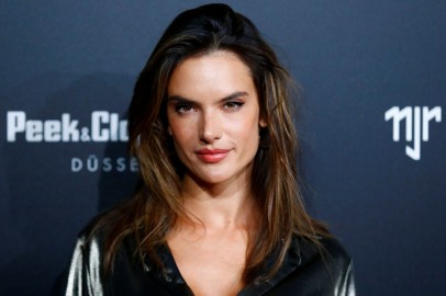 Model Alessandra Ambrosio poses as she arrives at an after show party following the launch event for the new Capsule Collection Neymar Jr.