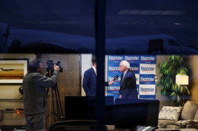A local televison reporter interviews Democratic 2020 U.S. presidential candidate Sanders