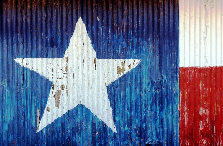 Texas flag on a barn side