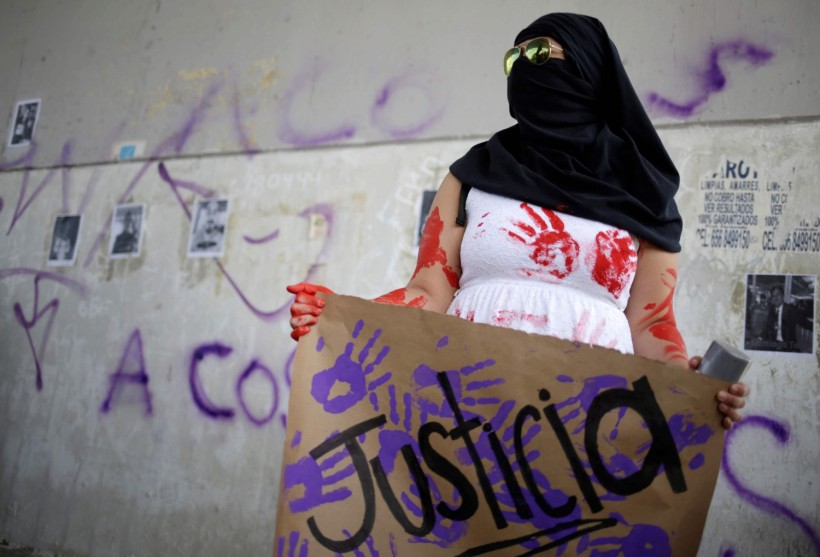 Women take part in a protest to demand justice for victims of femicide and gender violence in Ciudad Juarez