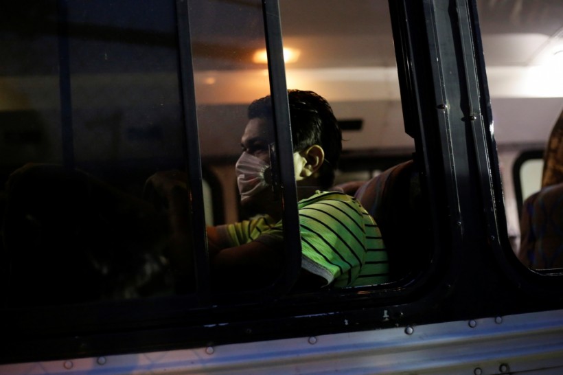 Honduran immigrants who were deported on a flight from Mexico are bused to a shelter to be quarantined due to the spread of the coronavirus disease (COVID-19), in Tegucigalpa