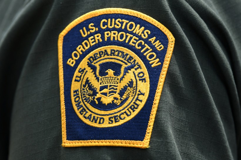 A U.S. Customs and Border Protection patch is seen on the arm of a U.S. Border Patrol agent