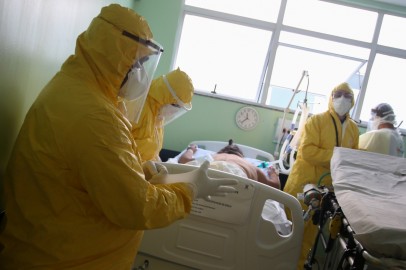 Nurses of Emergency Rescue Service (SAMU) prepare to transport a patient from an emergency health center to a hospital during the spread of the coronavirus disease (COVID-19) in Santo Andre, Sao Paulo State, Brazil.
