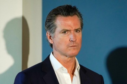 California governor Gavin Newsom waits to speak at a news conference in San Diego, California, U.S.