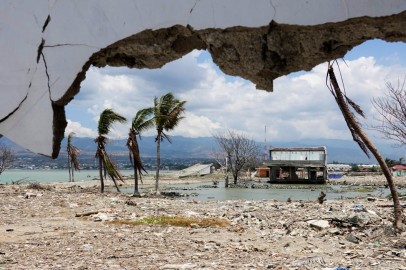 Ruins and damaged building are pictured nearly one year after an earthquake and tsunami at a beach in Palu, Central Sulawesi, Indonesia,