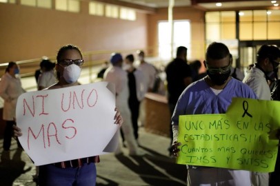 Medical personnel from General Hospital No. 6 of the Mexican Institute of Social Security (IMSS) hold a protest after the death of a colleague, due to what they say is the lack of equipment to treat patients with the COVID-19, in Ciudad Juarez, Mexico.