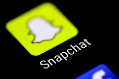 The Snapchat messaging application is seen on a phone screen