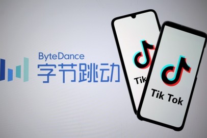 FILE PHOTO: Tik Tok logos are seen on smartphones in front of displayed ByteDance logo in this illustration