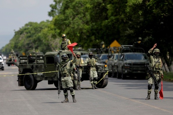 Members of the National Guard are seen at a military check point after Mexican security forces captured Jose Antonio Yepez known as 