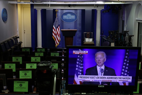 President-Elect Joe Biden's Address To The Nation Is Shown On Televisions At The White House