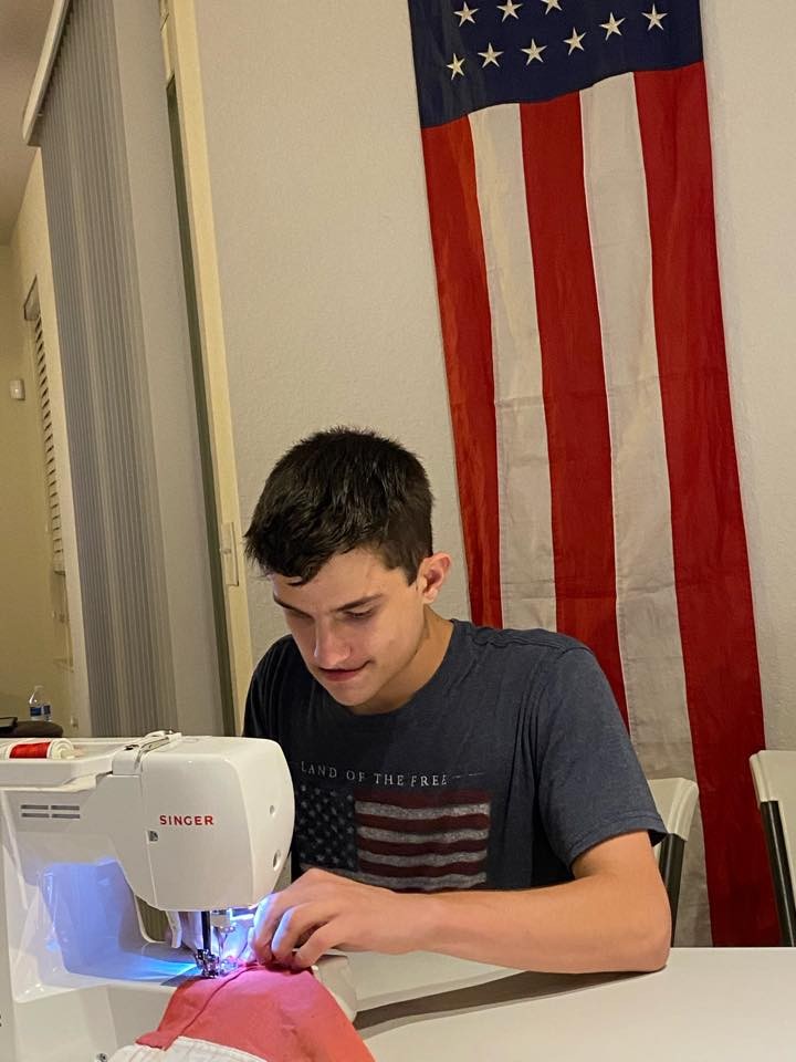Florida Teen Saves, Repairs Tattered American Flags for Local Businesses