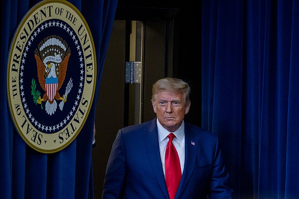 Trump Pardons 15, Including Men Convicted in Mueller Investigation
