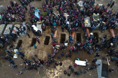 Guatemala Community Buries Victims 