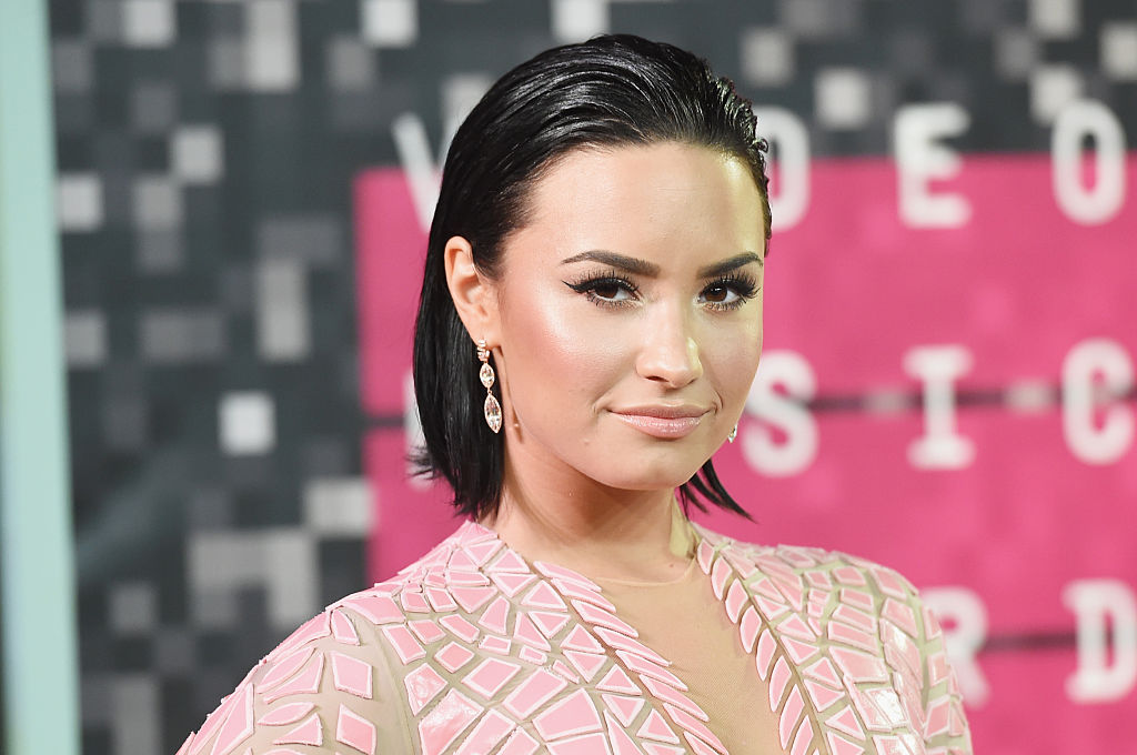 Demi Lovato's 'offensive to Christians' album posters banned