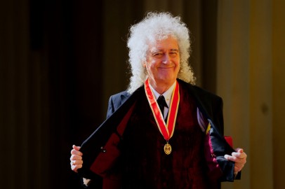 King Charles Knights Queen Guitarist Brian May in Buckingham Palace