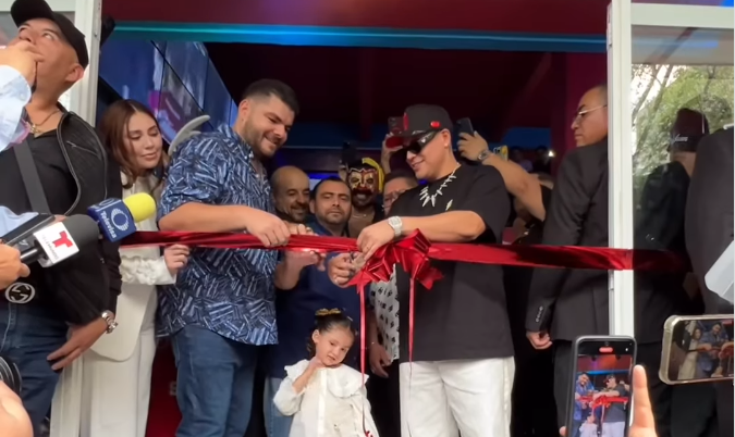 Max Peraza & Eduin Caz cut the ribbon at the grand opening of 'Agustito.'