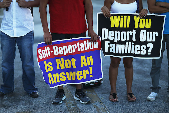 Immigration Reform News Activist Hold Rally In Chicago Against Obamas Deportation Raids