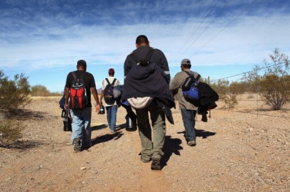 Undocumented Immigrants Cross Into The United States From Mexico
