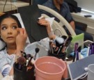 Woman-Applies-Makeup-While-in-Labor