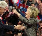Hillary Clinton is greeted by former president and husband Bill Clinton 