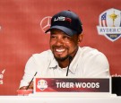 Team USA Vice Captain Tiger Woods smiles and laughs during a press conference following the team's victory in singles matches of the 2016 Ryder Cup at Hazeltine National Golf Club on October 2, 2016 in Chaska, Minnesota.