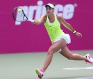 Ana Konjuh of Croatia returns a shot during the match against Tatjana Maria of Germany on Day 1 of WTA Guangzhou Open on September 19, 2016 in Guangzhou, China.