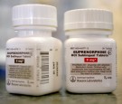 In this photo illustration, bottles of the generic prescription pain medication Buprenorphine are seen in a pharmacy on February 4, 2014 in Boca Raton, Florida. 