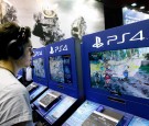 A gamer plays the video game 'For Honor' published by Ubisoft games editor on Sony PlayStation game console PS4 during the 'Paris Games Week'on October 26, 2016 in Paris, France.