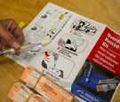 View of an 'Overdose Rescue Kit,' which includes naloxone, a syringe for nasal atomization, and instructions, as displayed at Howard Center, Burlington, Vermont, May 24, 2016. Naloxone can block the e