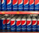 Pepsi Cola King Can on Store Shelf; Pepsi is a carbonated...