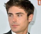 Actor Zac Efron arrives at the 'Parkland' premiere during the 2013 Toronto International Film Festival at Roy Thomson Hall