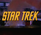 The title screen from 'The Man Trap,' the premiere episode of 'Star Trek,' shows an explosion on the bridge of the Starship Enterprise