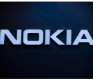 'Nokia' logo sits illuminated outside the Nokia pavilion at the annual Mobile World Congress