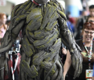  A cosplayer dressed as the character Groat from the movie Guardians of the Galaxy, attends the second day of Comic Con International 2015 in San Diego, California, July 10, 2015