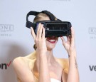 Jaime King viewing Rogue One: Recon - A Star Wars 360 experience on a Samsung Gear VR headset at the launch hosted by the Verizon Wireless flagship store on November 10, 2016 in Santa Monica, Ca.