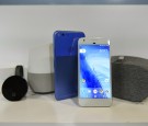 The Google Wifi router, from left, Chromecast Ultra, Home, Pixel XL, Pixel, and Daydream View devices sit on display during a product launch event in San Francisco, California, U.S. 