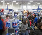 People, some waiting in line since 3am to get deals on Black Friday, shop at Best Buy on November 25, 2016 in Highland, Illinois.