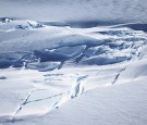 Ice is viewed near the coast of West Antarctica from a window of a NASA Operation IceBridge airplane on October 28, 2016 in-flight over Antarctica. 