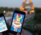 A tourist plays Nintendo Co.'s Pokemon Go augmented-reality game at the Trocadero in front of the Eiffel tower on September 8, 2016 in Paris, France.