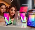 South Korean models pose with LG's new premium smartphone V20 during a launch event in Seoul on September 7, 2016. 