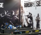 Visitors play Tom Clancy's Rainbow Six: Siege, a video game published by Ubisoft, on October 28, 2015 at the Paris Game Week, a trade fair for video games in Paris. 