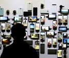 An attendee looks at a display of new Google devices during a Google media event on September 29, 2015 in San Francisco, California.