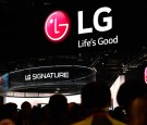 Attendees walk through the LG booth at CES 2016