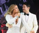 Mariah Carey (L) and dancer Bryan Tanaka perform during the opening show of Mariah Carey: All I Want For Christmas Is You at Beacon Theatre on December 5, 2016 in New York City