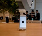 An iPhone 7 is exhibited in an Apple Store. 