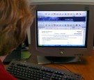 Owner of Rx Depot Chicago Mary Rutherford looks over the company's website September 17, 2003 in Chicago, Illinois.